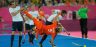 Great Britain's Matt Daly and Iain Lewers combine to foul Netherlands Roderick Wuesthof during their semi-final at the London 2012 Olympic hockey tournament