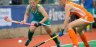 Australia's Georgia Nanscawen is challenged by Netherlands Kitty van Male in the Investec Challenge in South Africa. Nanscawen scored Australia's second goal.